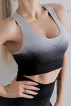 Gradient Racerback Sports Bra in gradient gray and black, designed for high-performance workouts.