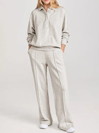 Collared Sweatshirt and High Waist Pants Active Set worn by a model, showcasing comfort and style in grey fabric.