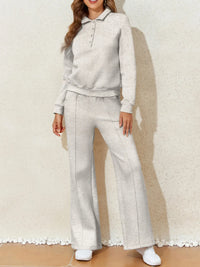 Collared Sweatshirt and High Waist Pants Active Set worn by a model showcasing a stylish gray outfit.